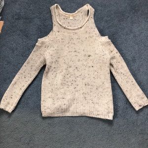 Knit sweater with cut out shoulders